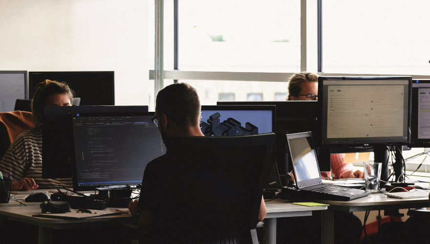 A team working at their desks