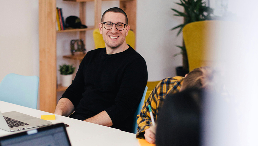 A photo of a man in a meeting